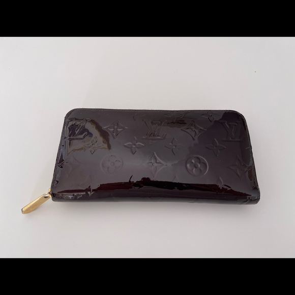 Pre owned Louis Vuitton Zippy wallet (color is Amaranth) - Picture 2 of 5
